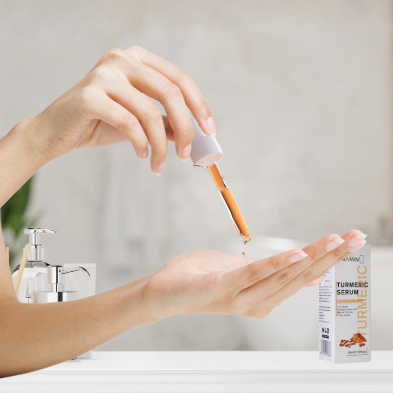 A few drops of turmeric dark spot corrector and glow serum