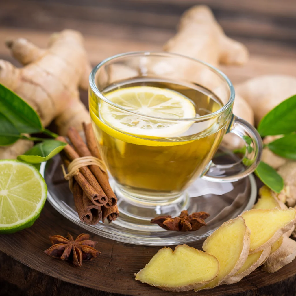 Ginger tea for cold and flu. Cup of ginger tea with lemon and spice- natural remedies